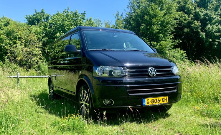 Complete en luxe VW Multivan met BREED BED