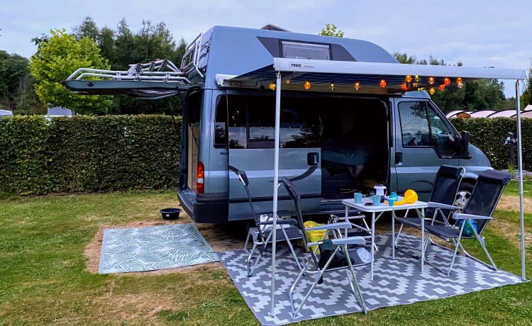 Super practical four-person Ford camper van