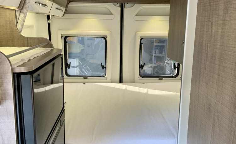 Experience the freedom of a compact bus camper