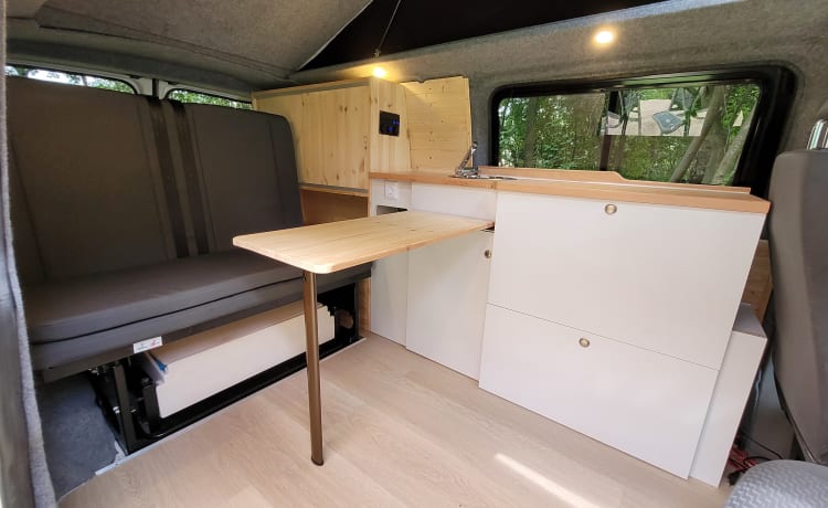 4-person Volkswagen with pop-up roof and long wheelbase for extra space