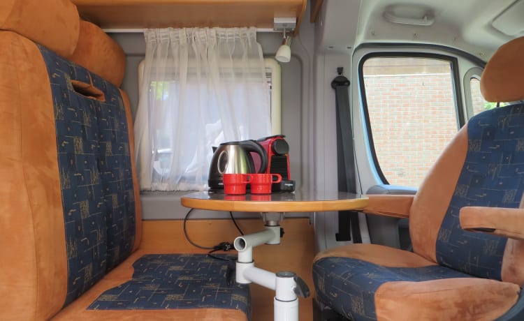 Compact bus camper with many useful extras