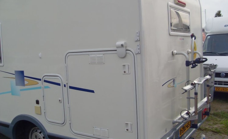 Experience Freedom and Comfort with this richly equipped Camper