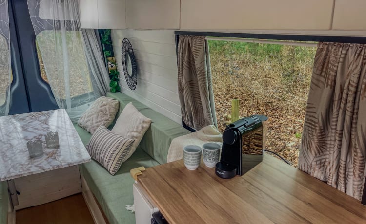 Orange – VW Crafter, very spacious, luxurious and comfortable off-grid campervan.