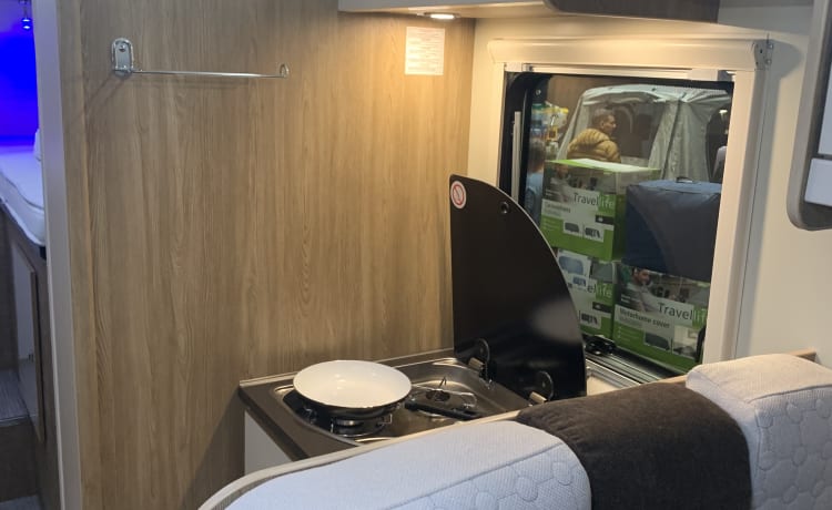 Mobil-home avec porte-vélo électrique et lit king-size !