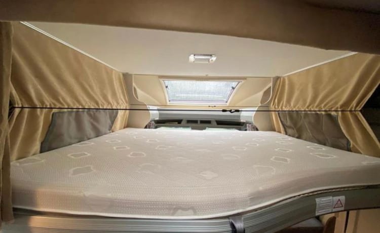 5p Burstner 726 Plus with single beds and electric fold-down bed