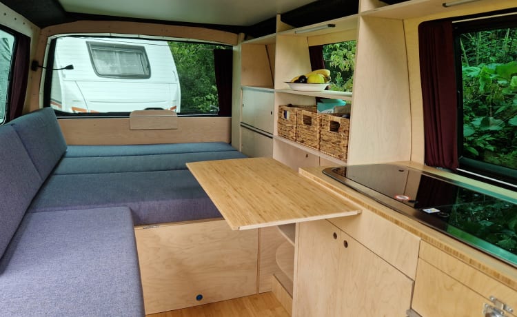 Self-built VW T5 camper for 2 people