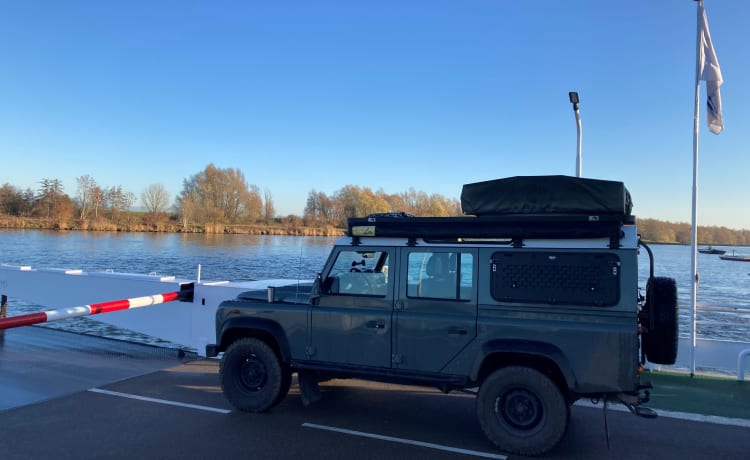 Land Rover Defender met daktent 