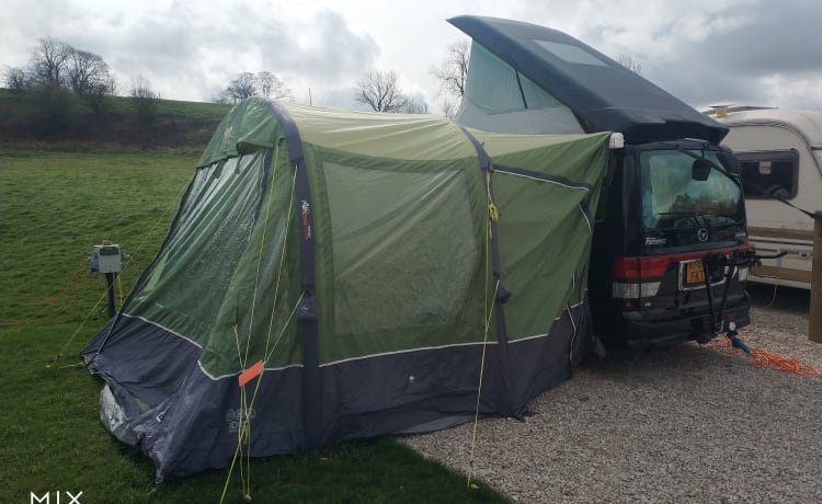 LOCATION DE CONVERSION DE GAZ BONGO AU BÉNÉFICE DANS LA TENTE ET LE PORTA L DE TOILETTES GRATUITES DE STAFFORD