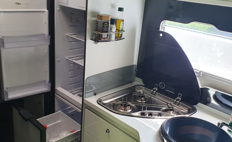 Mobil-home de luxe avec des lits spacieux et un très grand garage