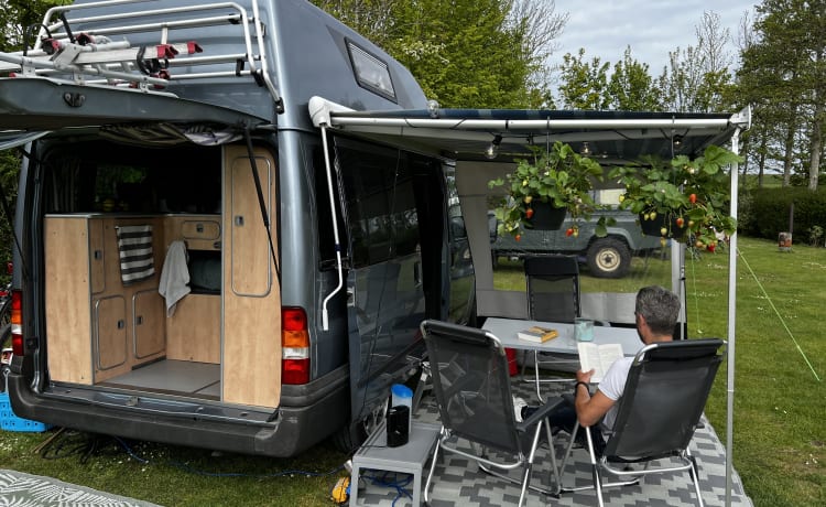 Super practical four-person Ford camper van