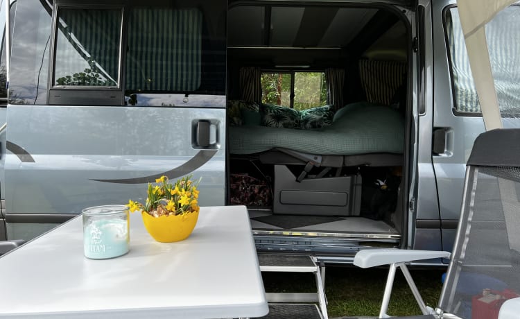 Super practical four-person Ford camper van