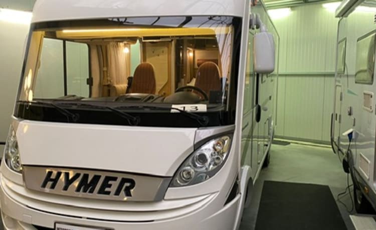 Very spacious and beautiful Hymer integral camper with queen bed