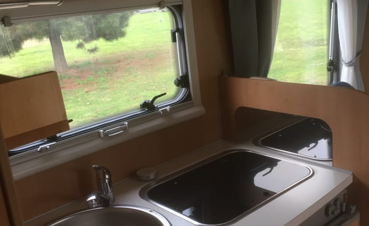 Enjoy an adventure in our spacious two-person camper.