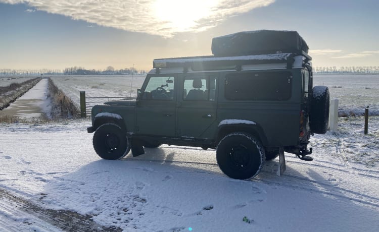 Land Rover Defender met daktent 