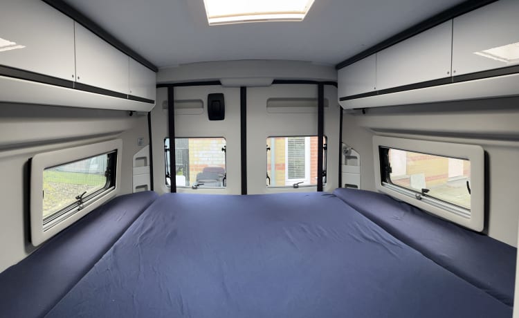 Fiat Adria 640 bus camper with large garage and fold-down bed 