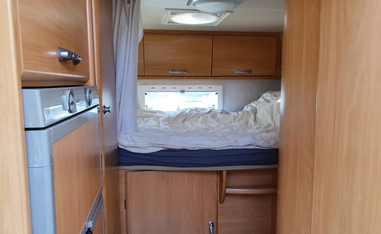 Experience Freedom and Comfort with this richly equipped Camper
