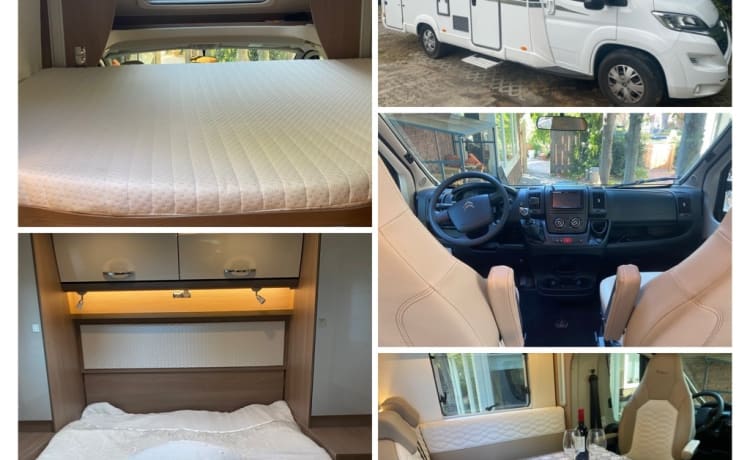 Luxurious, modern 4-person Bürstner with queen bed, pull-down bed and bicycle rack