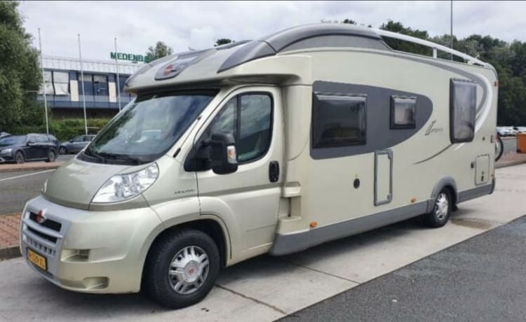 Nice family camper with sleeping places for 4 people.