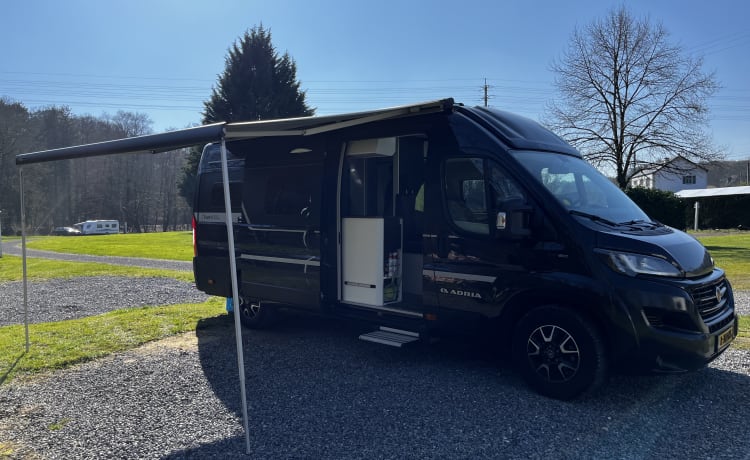 Fiat Adria 640 bus camper with large garage and fold-down bed 