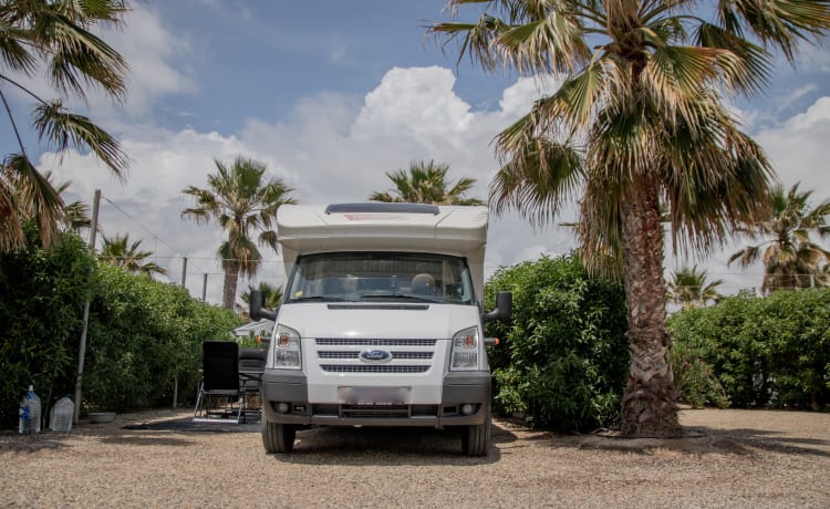 Ford Challenger semi-integrated camper with solar panels!