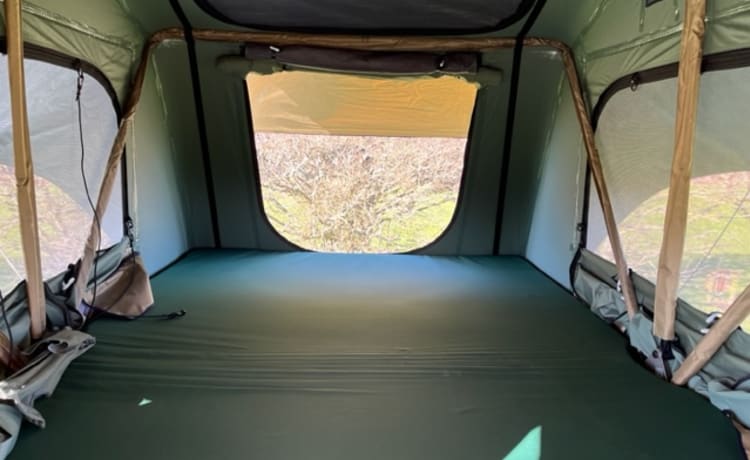 Avventura in tenda da tetto con Jeep Patriot e tenda da tetto Thule