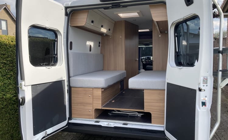 Sunliving – Sunliving Bus camper with bus biker 