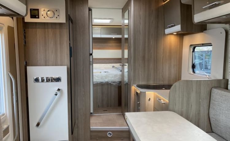 Enjoy comfort and freedom with this new semi-integrated camper