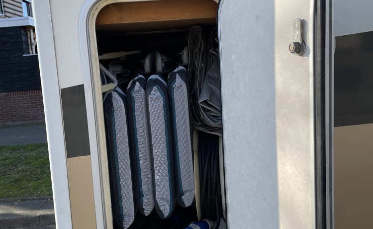 Adria Mobil alcove with 6 belts