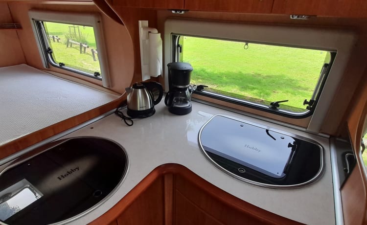 Spacious two-person Hobby camper with a spacious French bed