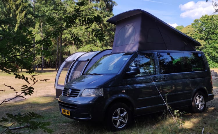 Happy Camper – Luxe 4/5p buscamper Volkswagen Multivan uit 2008