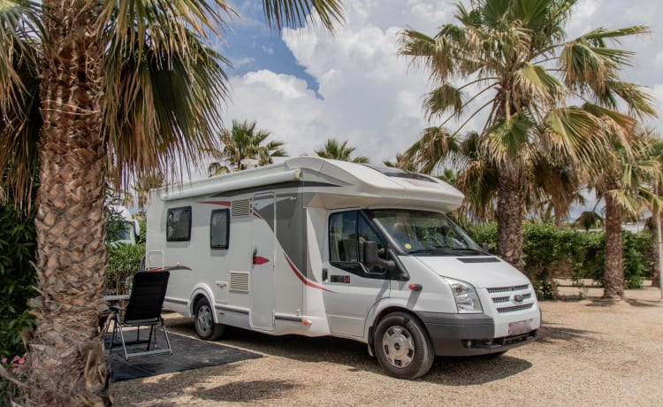 Ford Challenger semi-integrated camper with solar panels!