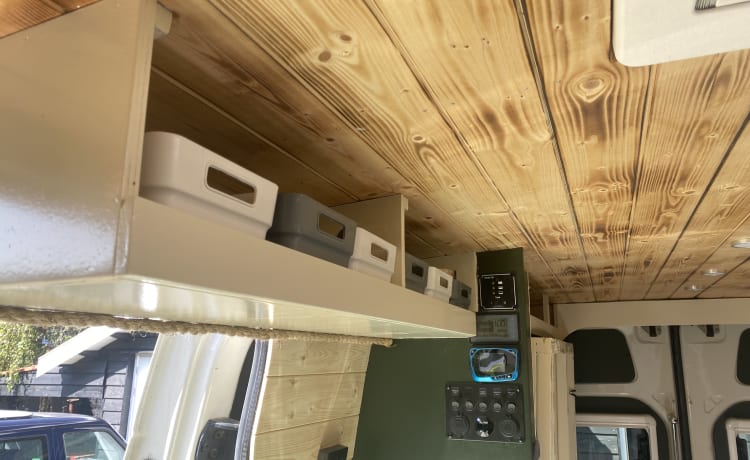 Home is where we park it! – Cool, fresh, self-sufficient 4 person bus camper.