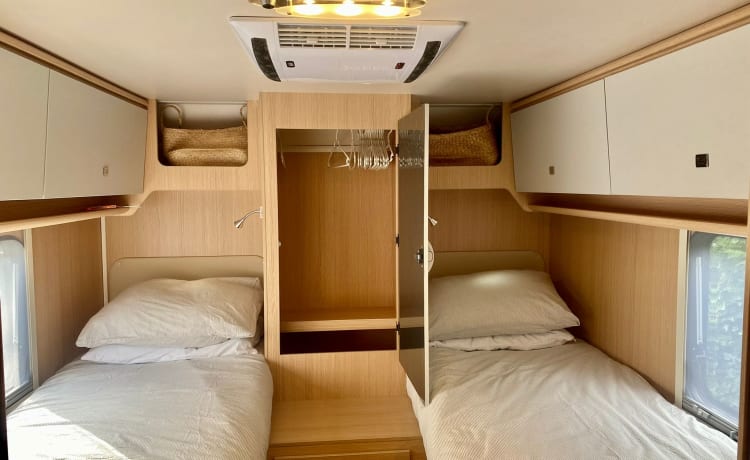 Luxury motorhome with air conditioning and separate sleeping area