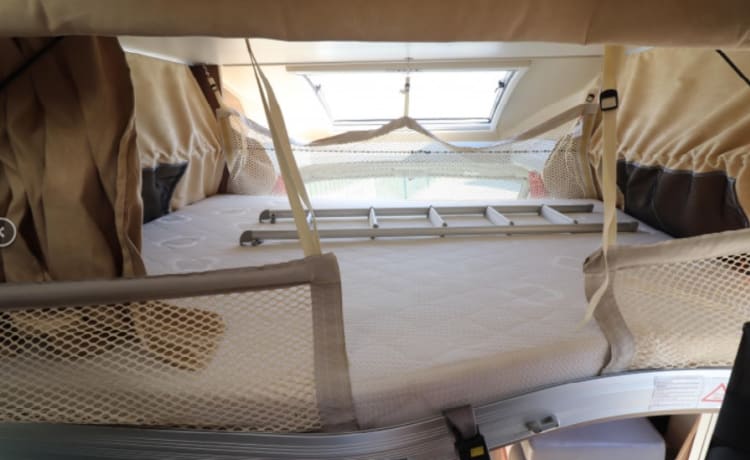 luxury camper for rent Challenger queen bed dish