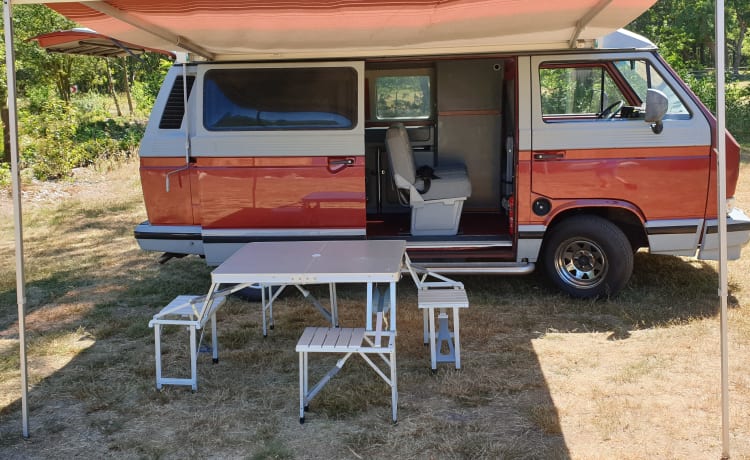 Original retro Volkswagen T3 Dehler with complete camping equipment.