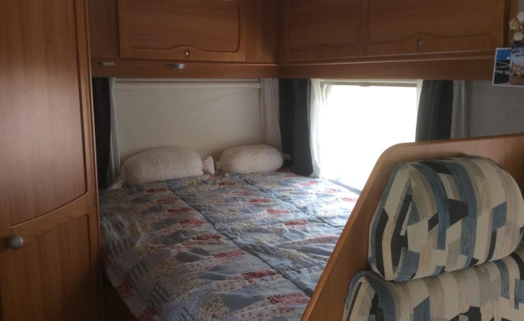 Dinghy  – Very neat and cozy camper for 2 people with sufficient storage space.