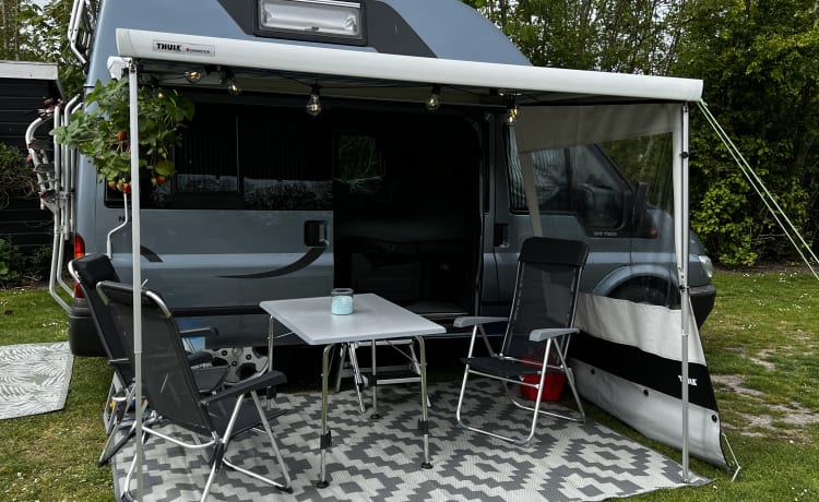 Super practical four-person Ford camper van