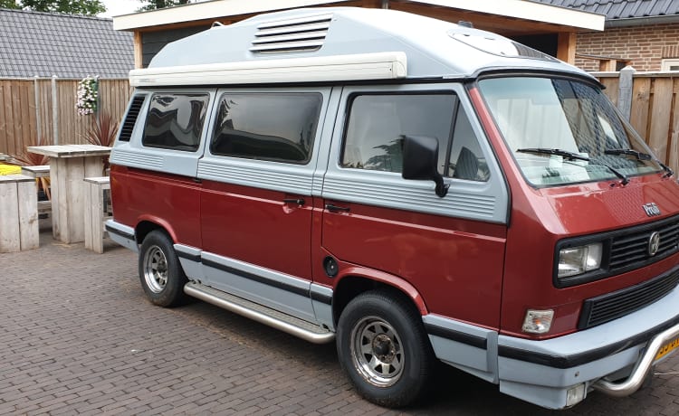 Original retro Volkswagen T3 Dehler with complete camping equipment.