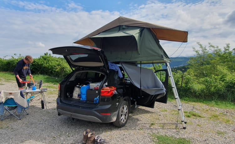 Daktent huren – Tente de toit Thule avec BMW X1