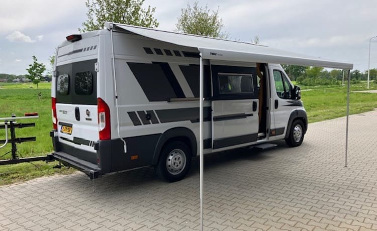 Heunie 1 – Bellissimo camper bus con 2 letti longitudinali