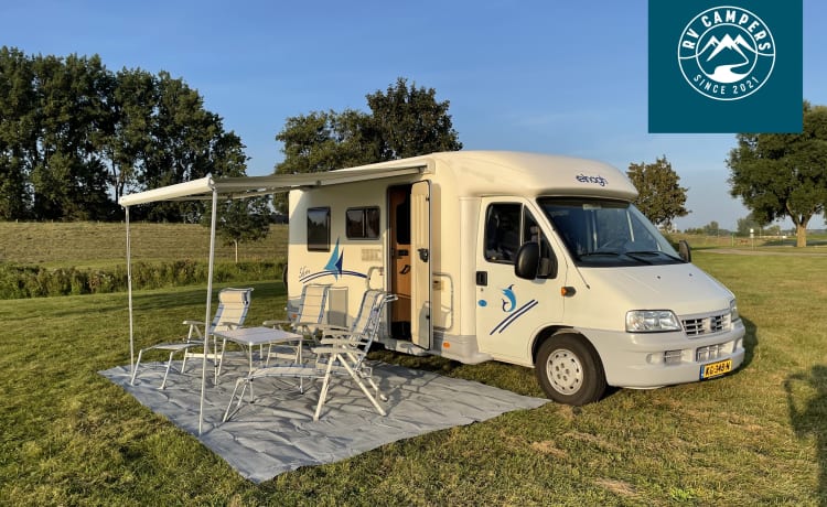 très beau camping-car compact pour 4 personnes