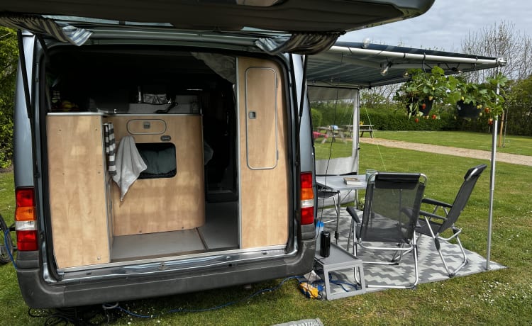 Super practical four-person Ford camper van