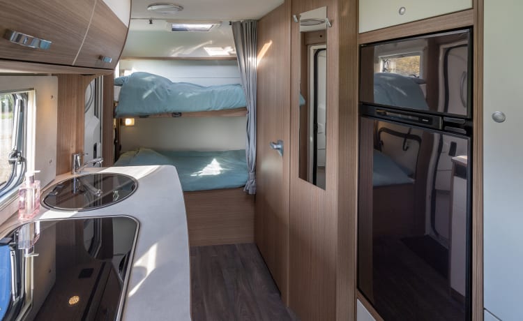 Carado  – Lovely new family camper, plenty of storage space, sleeping space and parking air conditioning