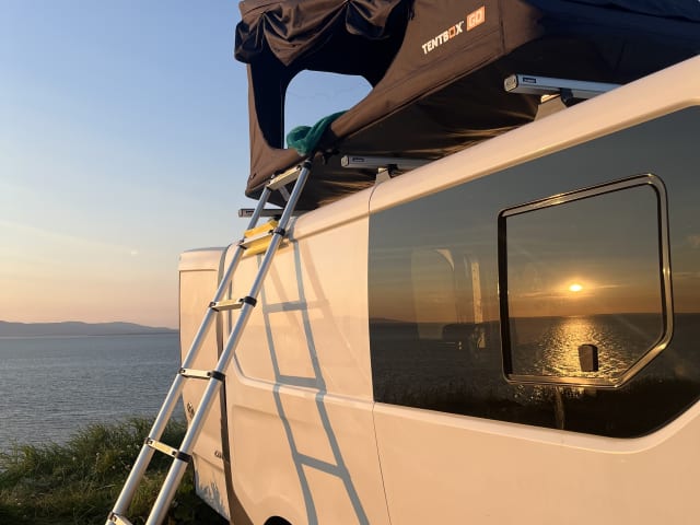 Disco Bus  – Vauxhall Vivaro aménagé avec tente de toit 