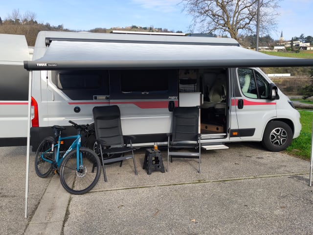 Off-grid campervan with lift-up bed, large garage 2024