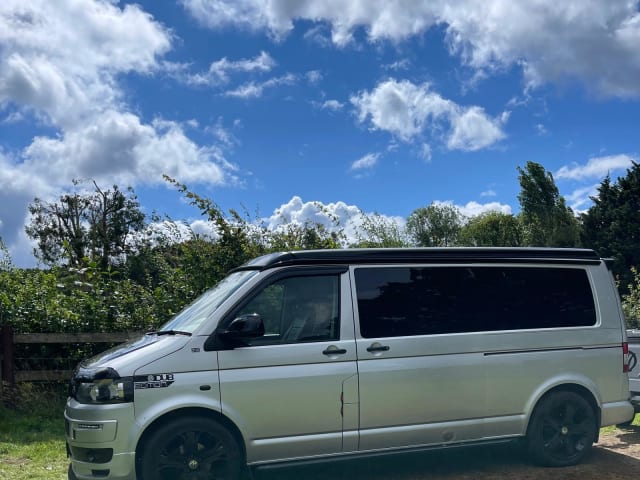 Quicksilver – Rent our Head Turning Quicksilver - LWB T5 with Pop Top roof