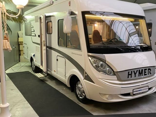 Very spacious and beautiful Hymer integral camper with queen bed