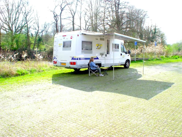 Bürstner Family Camper 4 persons, with bicycle carrier.