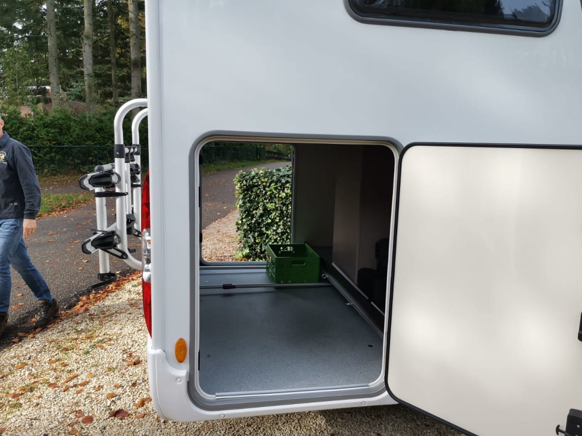 Luxury semiintegrated Burstner camper single beds & pulldown bed from