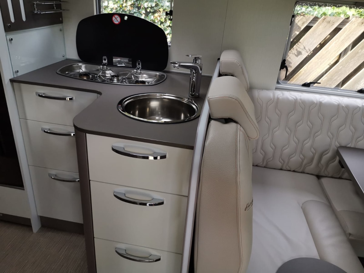 Luxury semiintegrated Burstner camper single beds & pulldown bed from